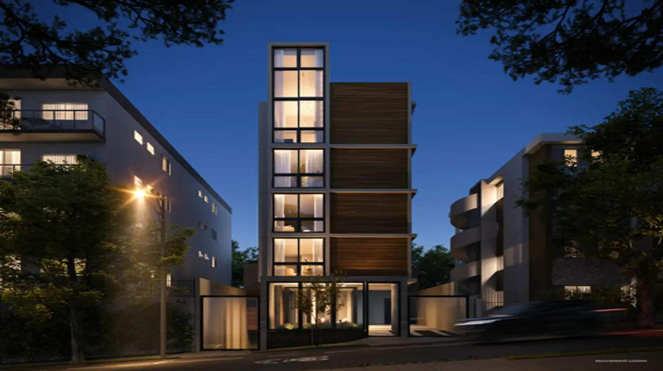 Apartamento à venda no Serra: Fachada noturna