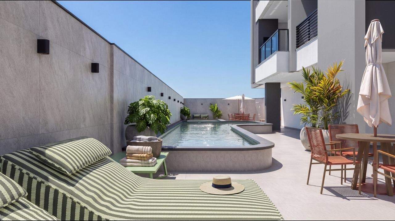 Piscina com deck e espreguiçadeiras do Essência Residence (imagem ilustrativa)