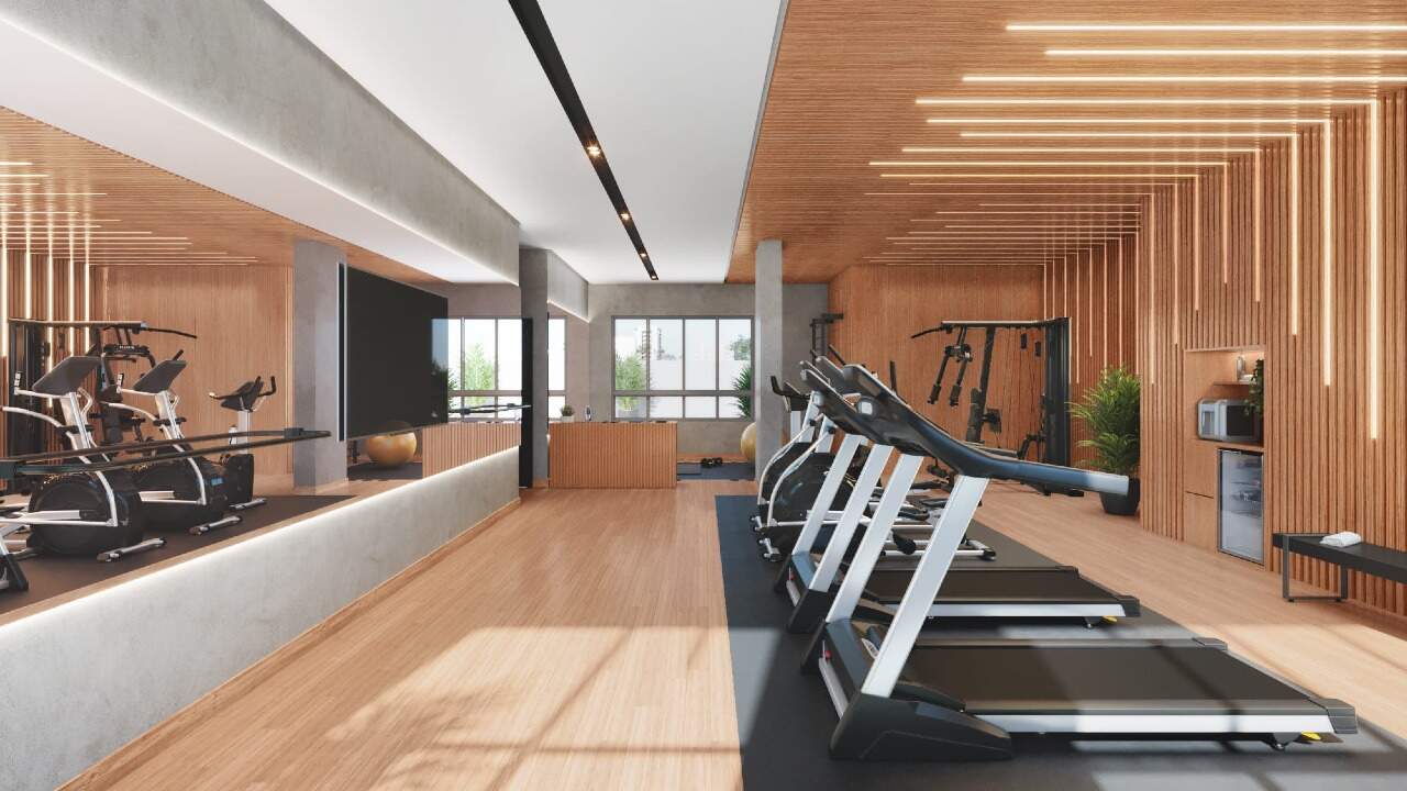 Academia com esteiras, bicicletas e estação de musculação (imagem ilustrativa)