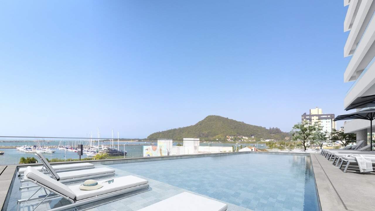 Piscina com deck e vista para a marina e o morro (imagem ilustrativa)