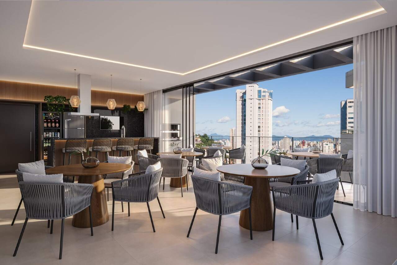 Espaço grill do rooftop, aberto para a vista da cidade (imagem ilustrativa)