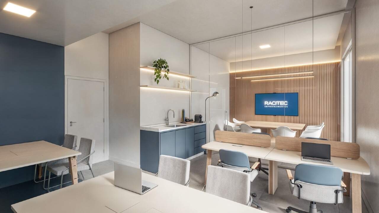 Coworking com mesas de trabalho e sala de reuniões (imagem ilustrativa)