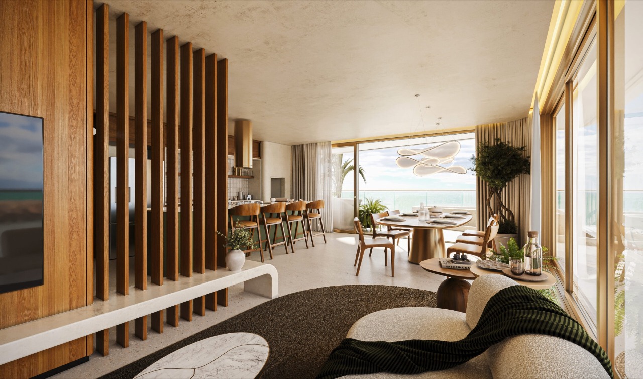 Living integrado de apartamento frente mar (imagem ilustrativa)