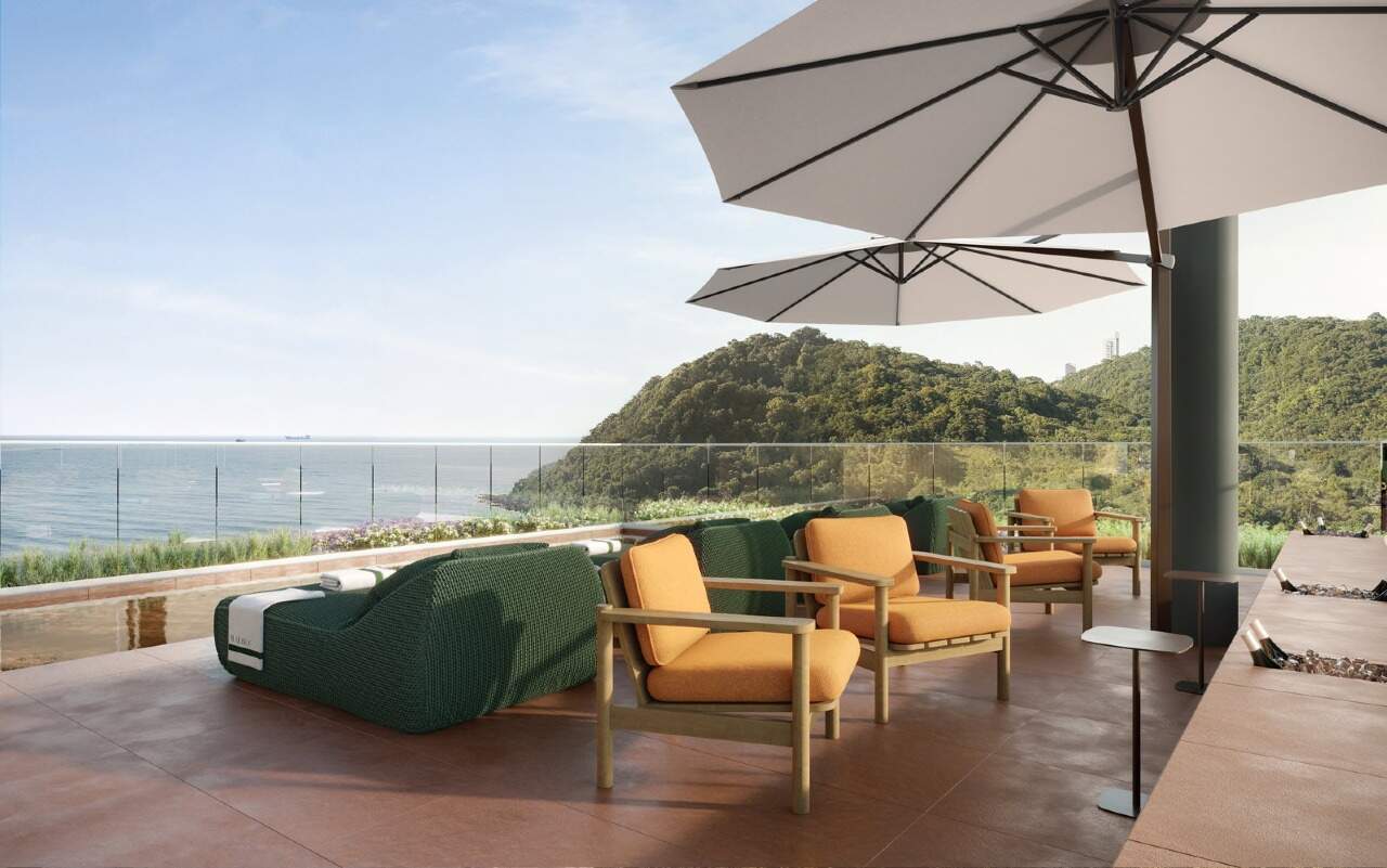 Rooftop com lounge ao entardecer (imagem ilustrativa)