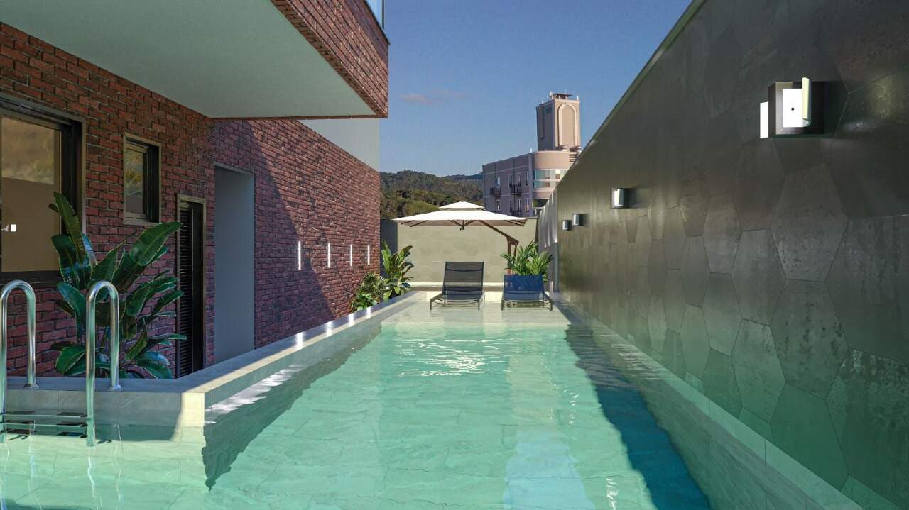 Piscina com raia e solarium no lazer (imagem ilustrativa)