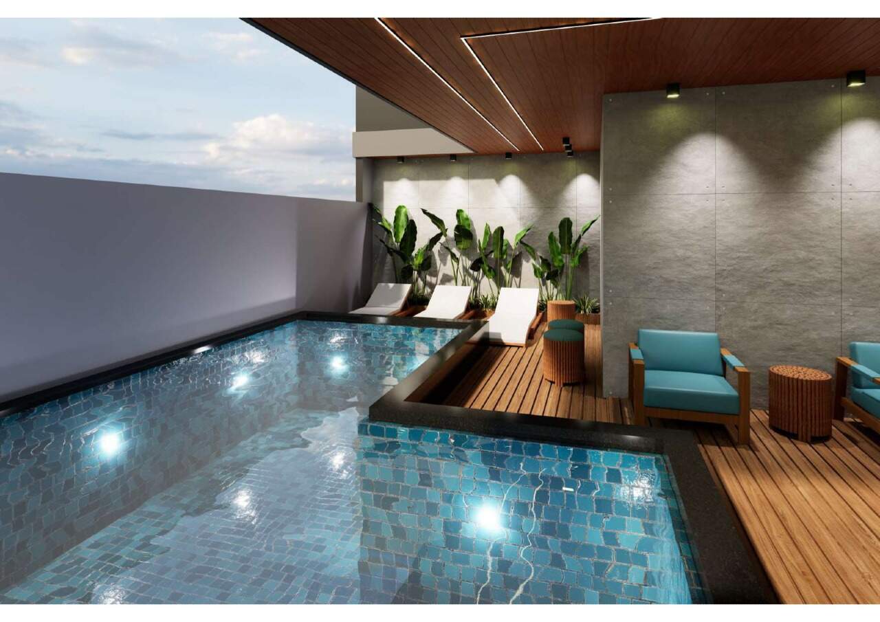 Piscina com espreguiçadeiras (imagem ilustrativa)