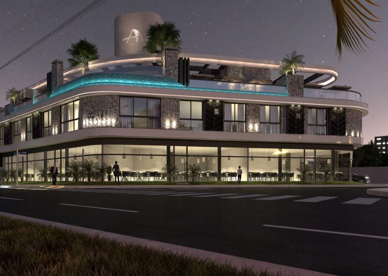 Fachada à noite, com as salas do térreo iluminadas (imagem ilustrativa)