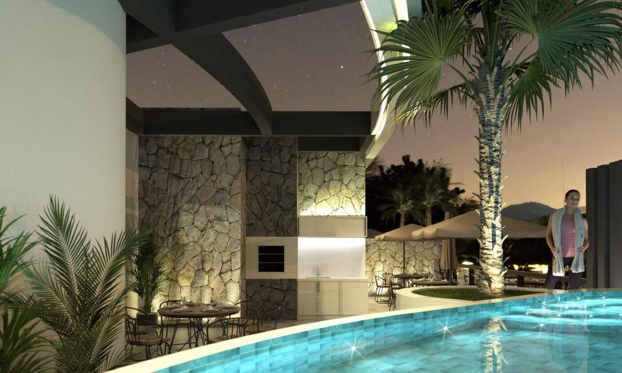 Piscina com palmeira e parede de pedra (imagem ilustrativa)