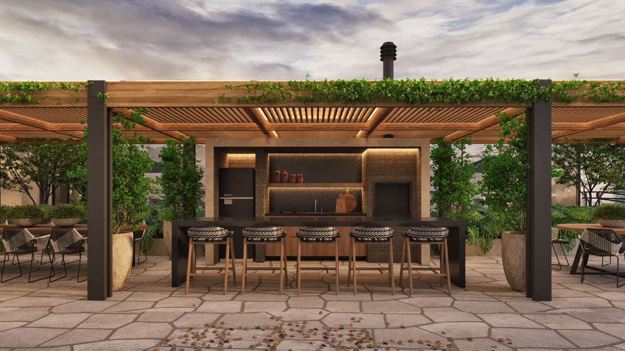 Espaço gourmet externo sob pergolado, com mesa comprida e cozinha (imagem ilustrativa)