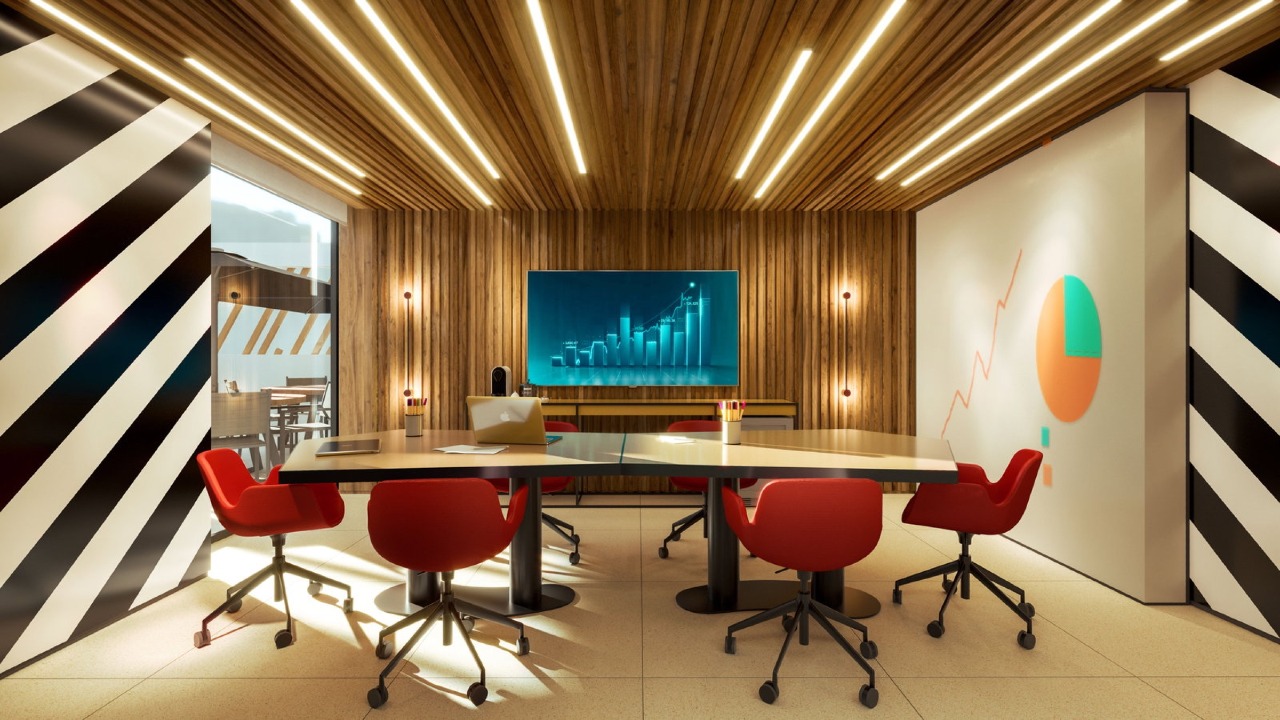 Coworking com mesa de reunião e painel de TV (imagem ilustrativa)