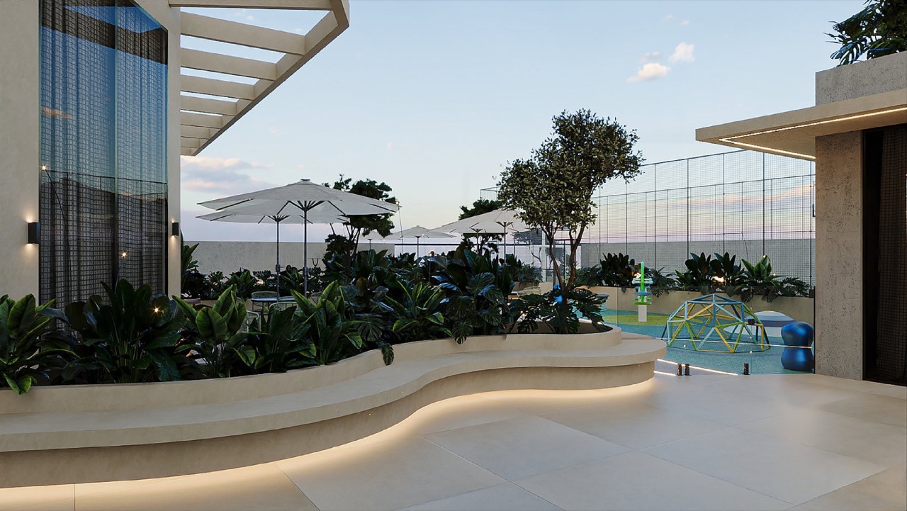 Terraço do lazer com bancos e jardineiras iluminadas (imagem ilustrativa)