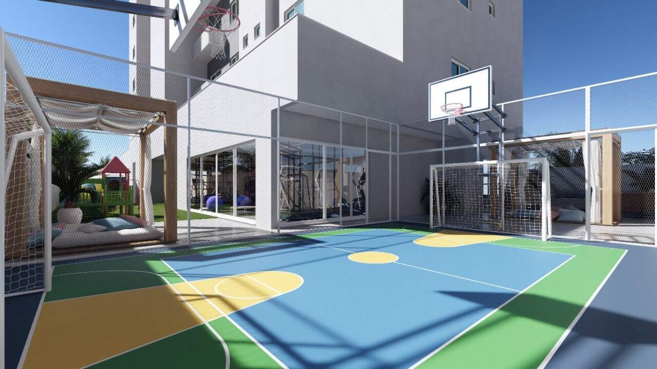 Quadra esportiva com cesta de basquete e gol