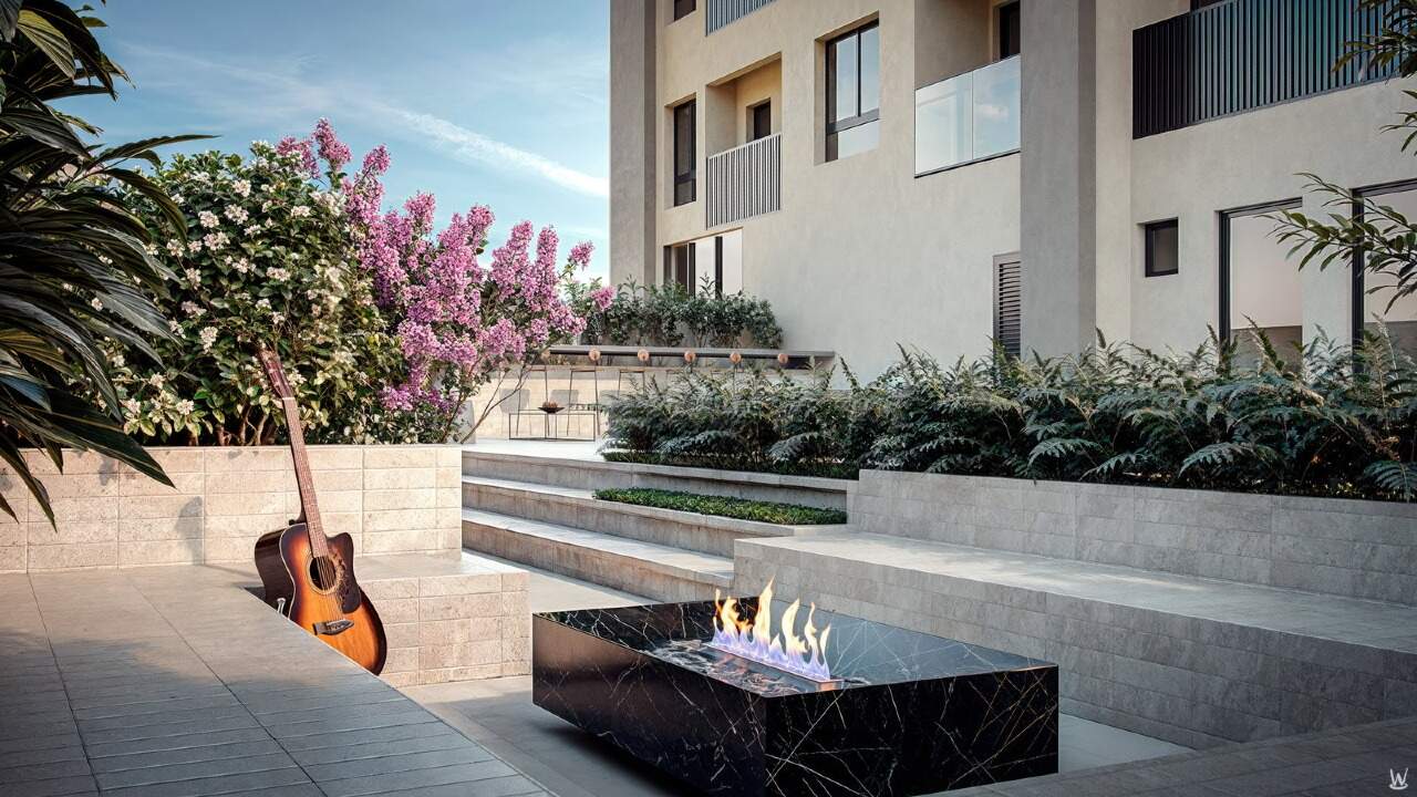 Fire place ao ar livre, com lareira e bancos (imagem ilustrativa)