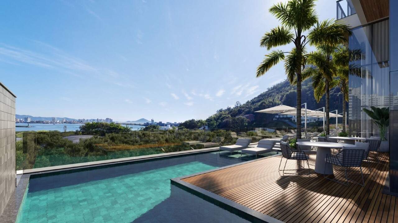 Piscina aquecida com deck e vista para o morro e a baía (imagem ilustrativa)