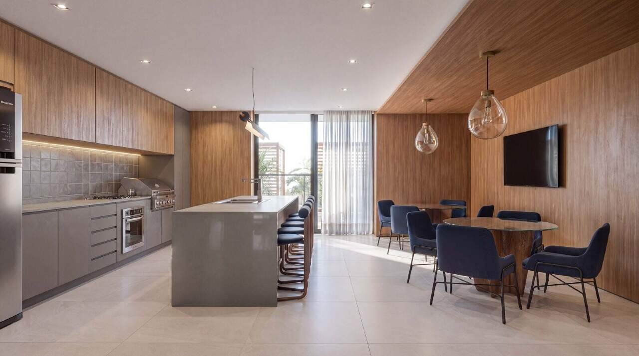 Salão gourmet com cozinha e mesa de jantar no Luminare (imagem ilustrativa)