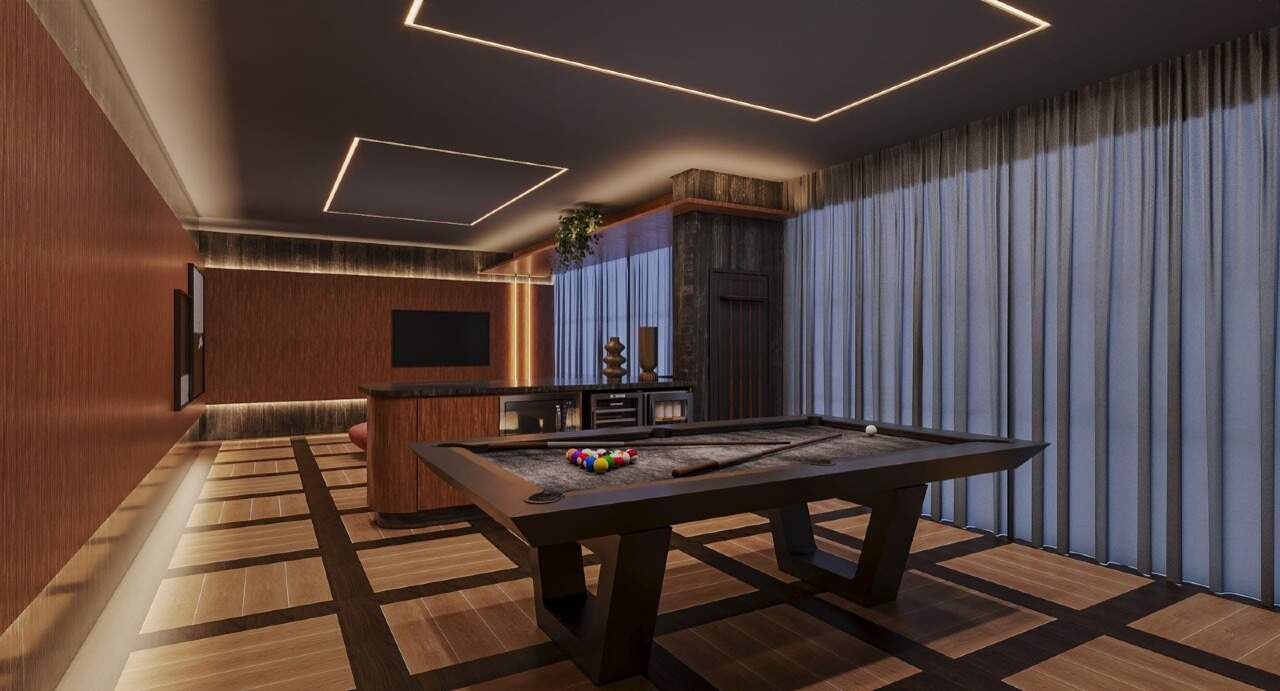 Sala de jogos com mesa de sinuca (imagem ilustrativa)