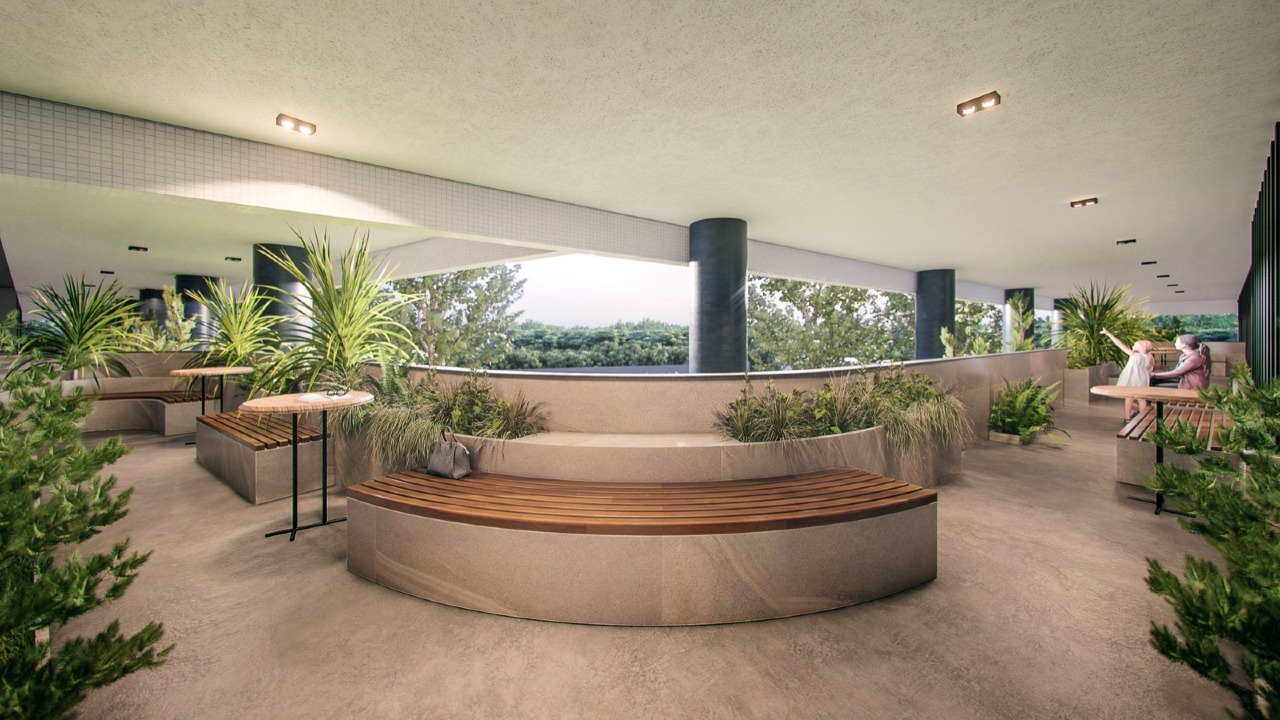 Terraço coberto com bancos, mesas altas e plantas (imagem ilustrativa)