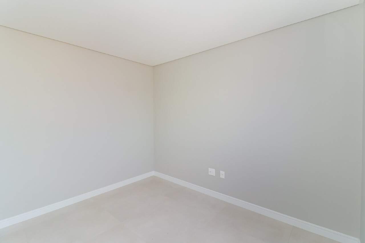 Apartamento à venda no Centro: Dormitório do apartamento. Foto real.