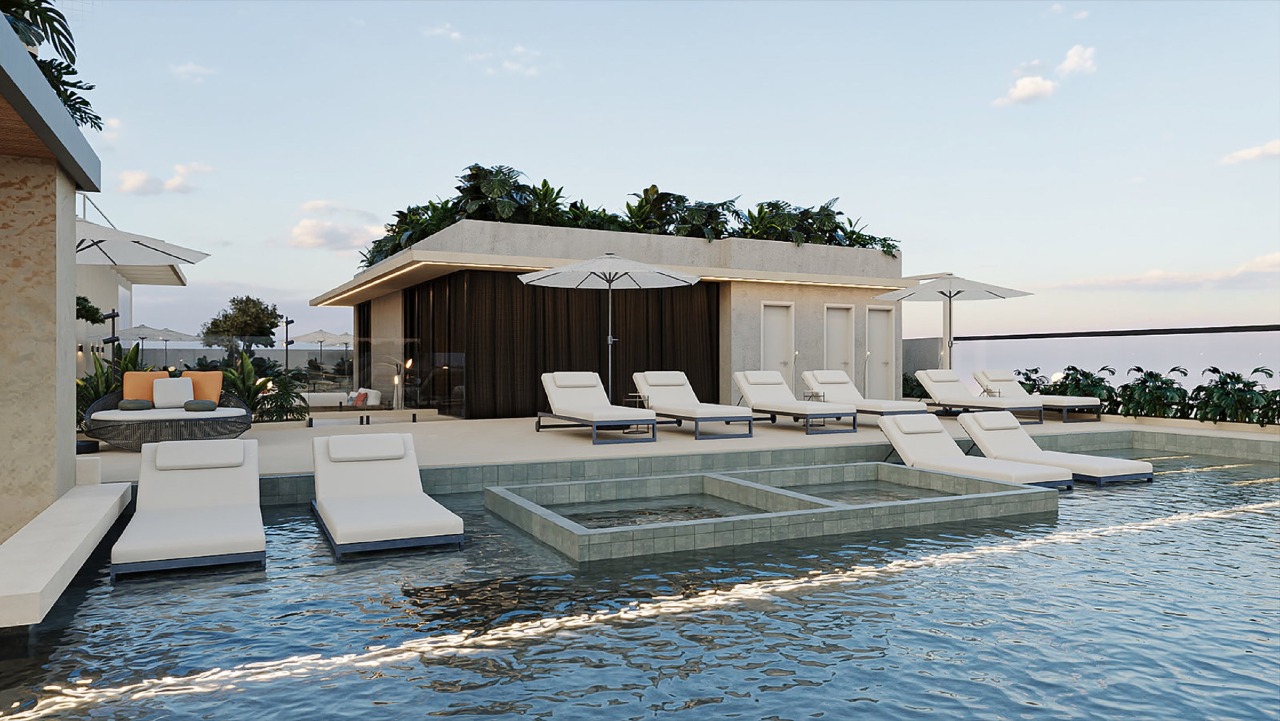 Apartamento à venda no Pioneiros: Piscina com prainha, espreguiçadeiras na água e quiosque (imagem ilustrativa)