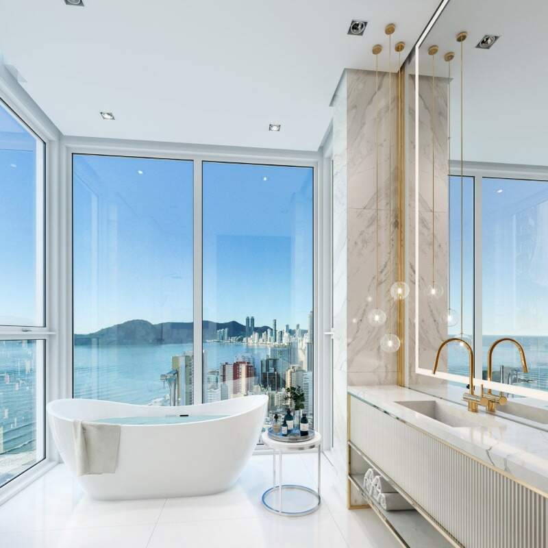Apartamento à venda no Centro: Sala de banho da suíte master com banheira e vista lateral para o mar (imagem ilustrativa)