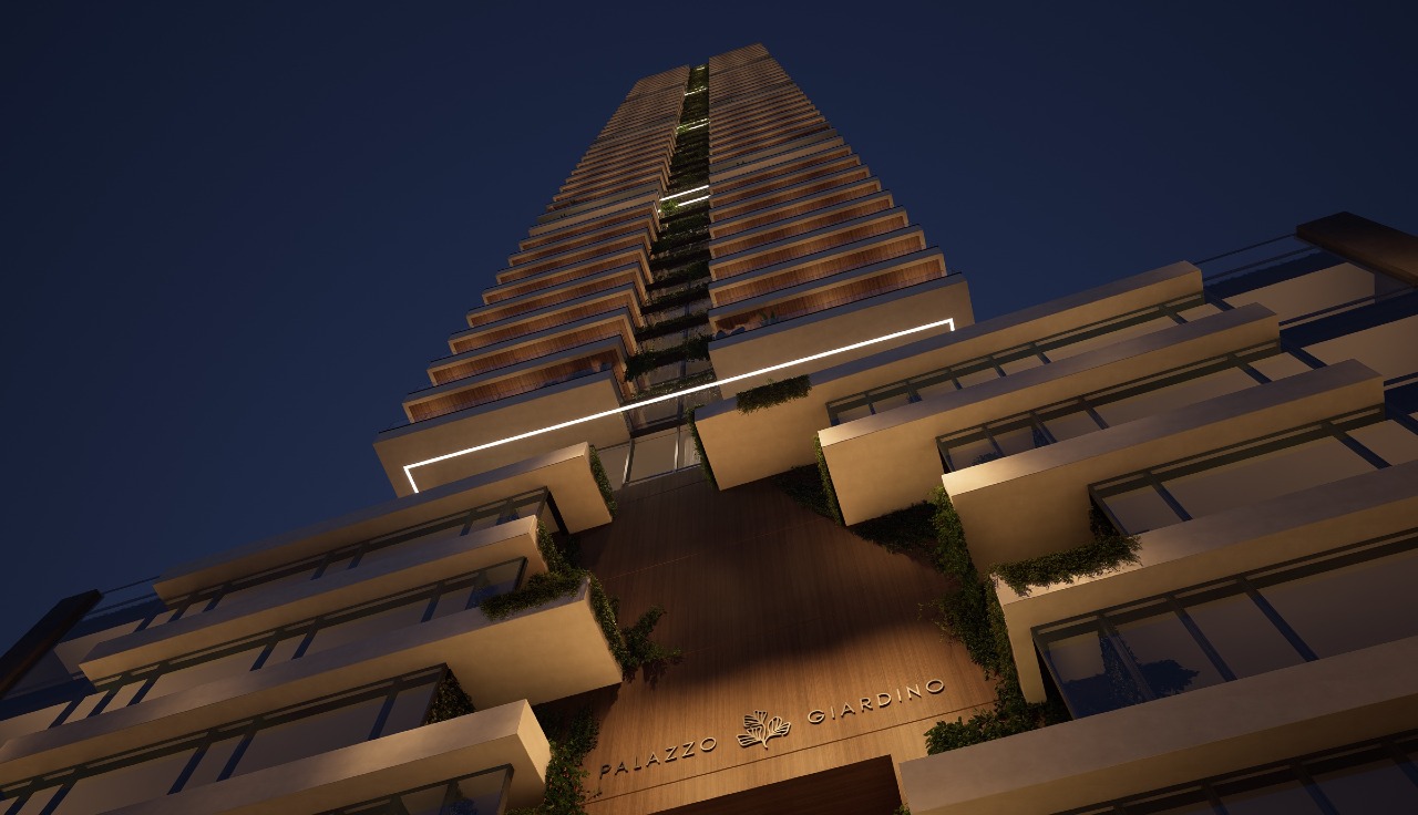 Apartamento à venda no Pioneiros: Torre do Palazzo Giardino iluminada, vista da base (imagem ilustrativa)