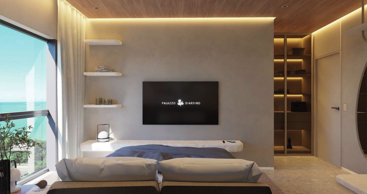 Apartamento à venda no Pioneiros: Suíte com painel de TV e janela de canto (imagem ilustrativa)