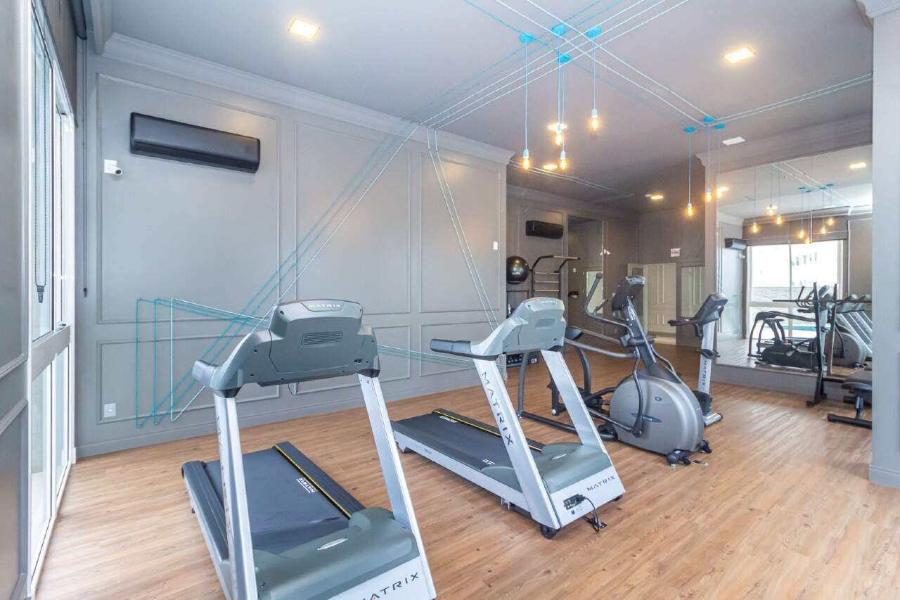 Apartamento à venda no Centro: Academia do Hamptons Village, com esteiras e elíptico