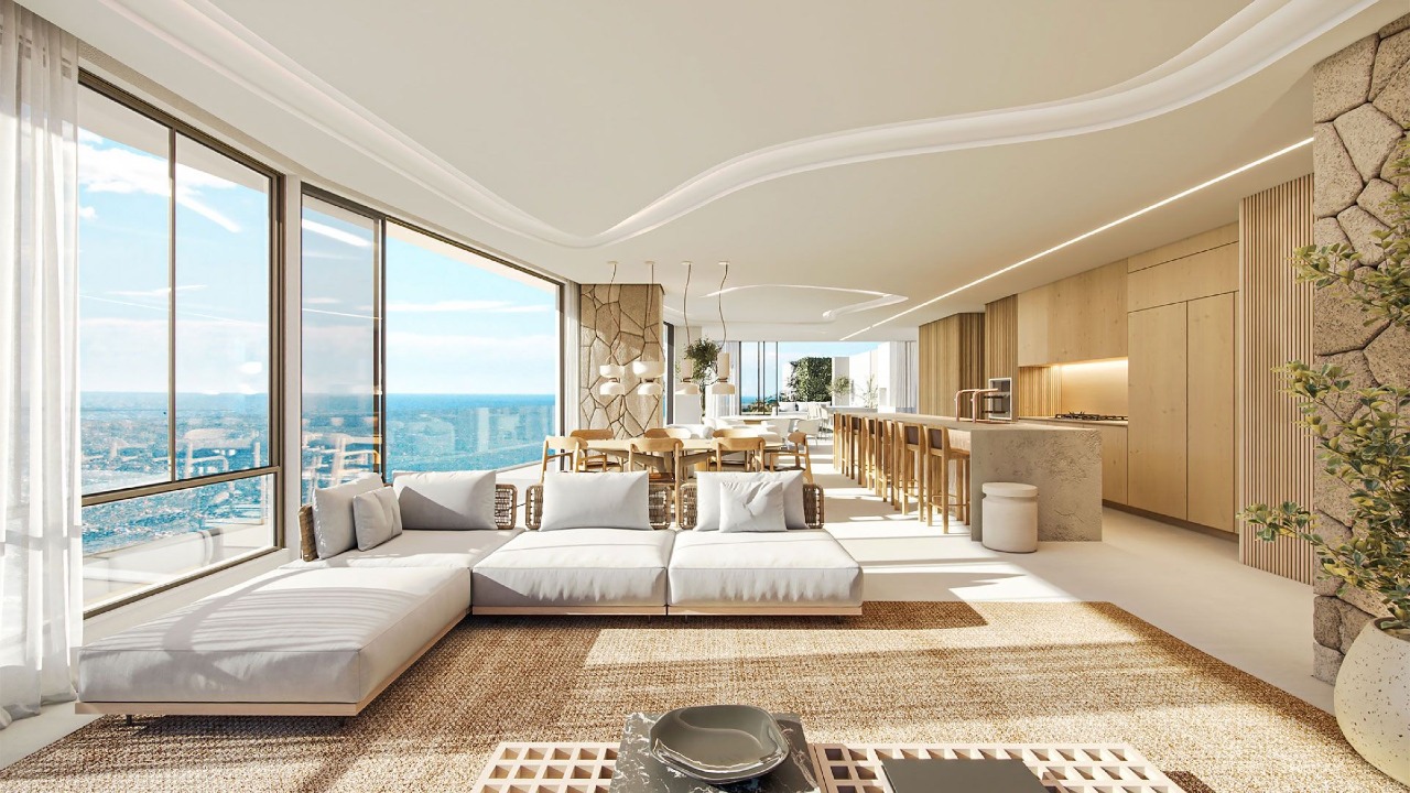 Cobertura à venda no Praia Brava: Living de cobertura do Scenarium, com cozinha integrada e vista para o mar (imagem ilustrativa)
