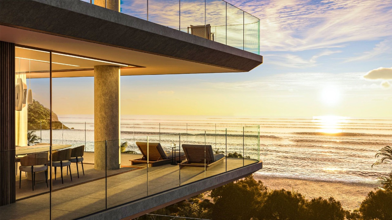 Cobertura à venda no Praia Brava: Varanda envidraçada com vista para o mar e a praia (imagem ilustrativa)