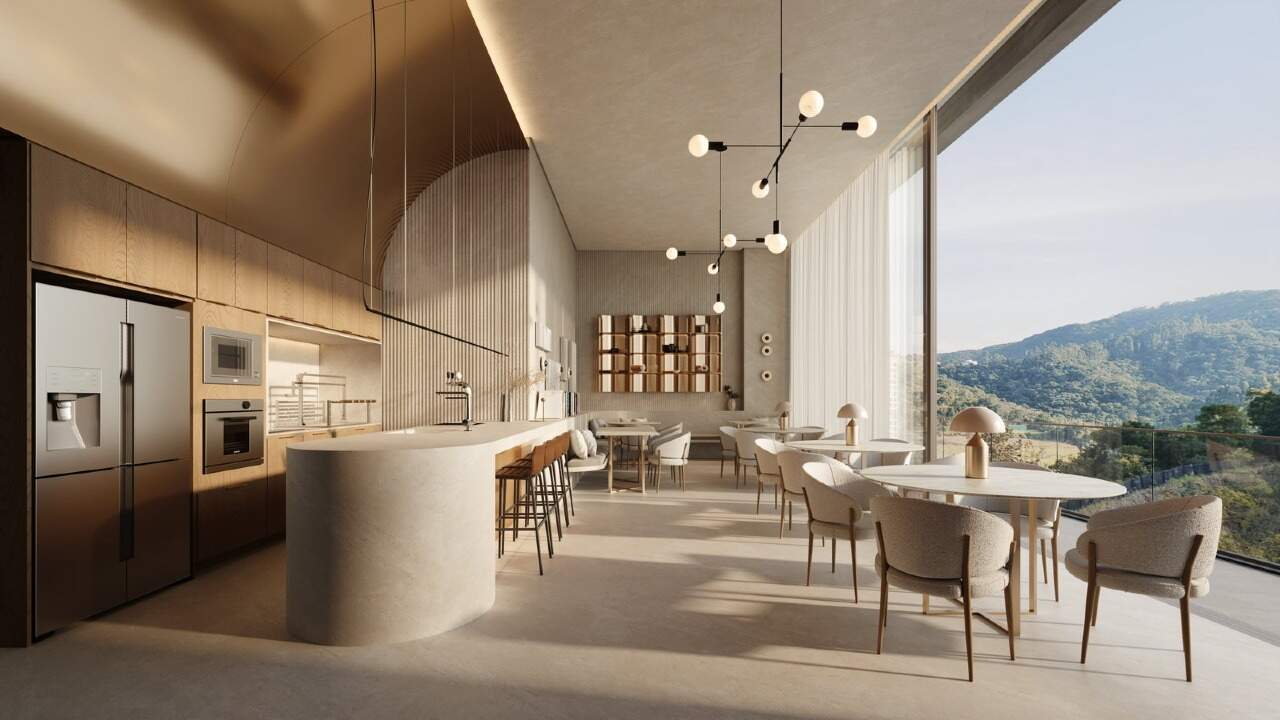 Apartamento à venda no Praia Brava: Área gourmet interna com cozinha e mesas (imagem ilustrativa)