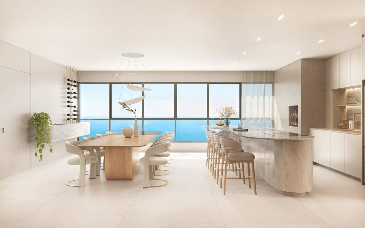 Apartamento à venda no Pioneiros: Jantar e cozinha com ilha do apartamento tipo (imagem ilustrativa, vista de andar alto)