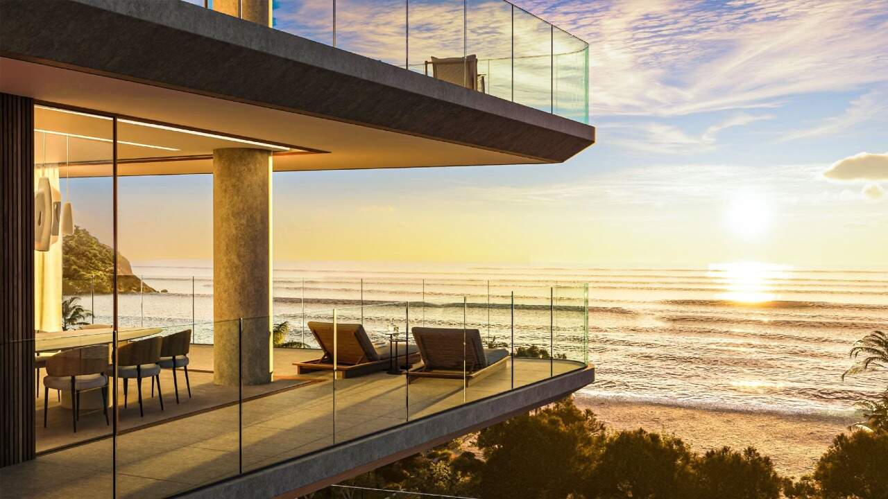 Apartamento à venda no Praia Brava: Varanda envidraçada com vista para o mar e a praia (imagem ilustrativa)