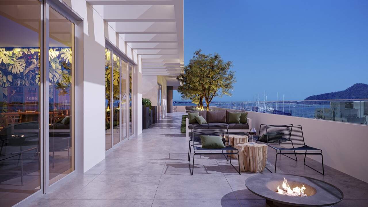 Apartamento à venda no Fazenda: Lounge externo com lareira no terraço do lazer (imagem ilustrativa)