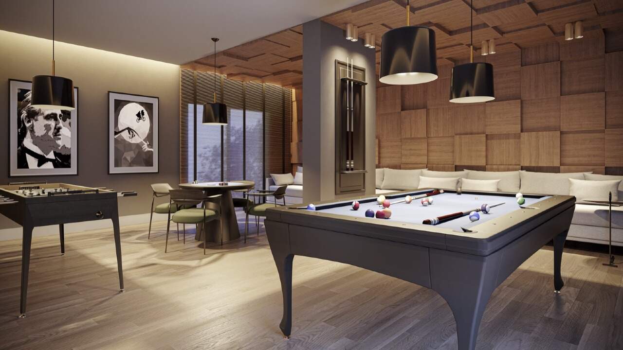 Apartamento à venda no Fazenda: Sala de jogos com mesa de sinuca e pebolim (imagem ilustrativa)
