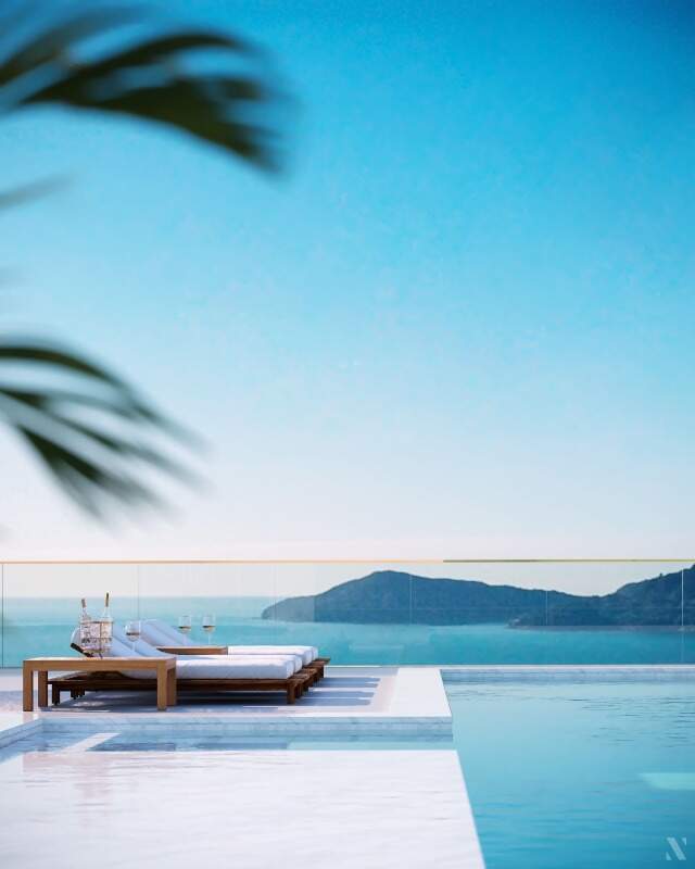 Apartamento diferenciado à venda no Centro: Deck da piscina externa, com o mar e os morros ao fundo (imagem ilustrativa)