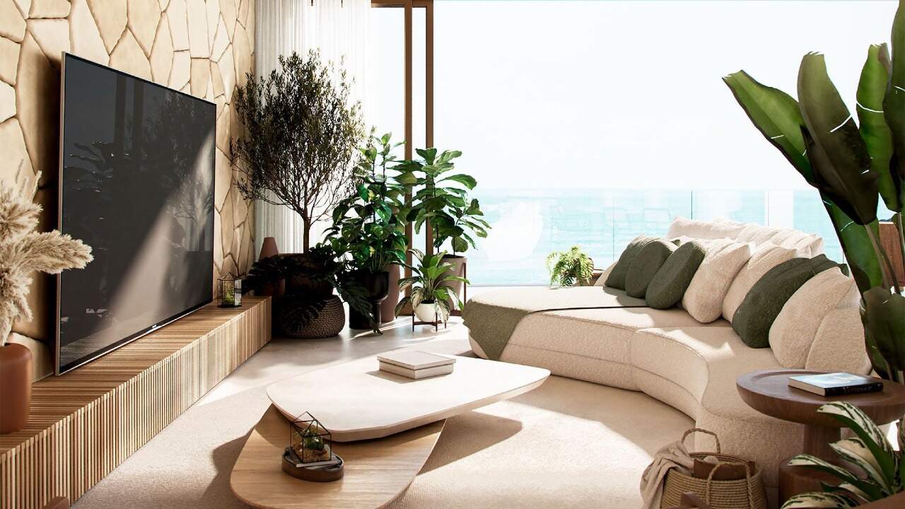 Apartamento diferenciado à venda no Praia Brava: Sala de estar com TV e plantas, aberta para o terraço (imagem ilustrativa)