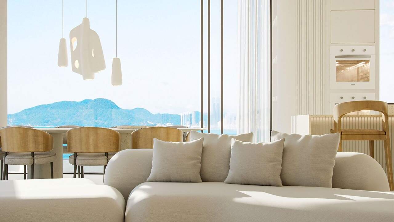 Apartamento diferenciado à venda no Praia Brava: Estar com vista para o mar e os morros da costa (imagem ilustrativa)