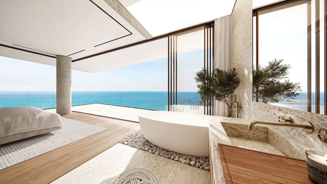 Apartamento diferenciado à venda no Praia Brava: Banho de suíte com banheira e vista para o mar (imagem ilustrativa)