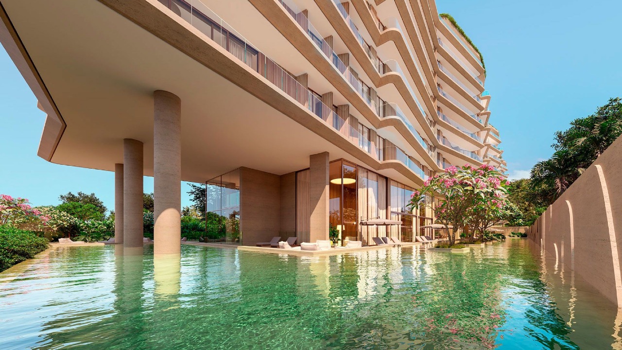 Apartamento diferenciado à venda no Praia Brava: Piscina do lazer sob a torre, com paisagismo tropical (imagem ilustrativa)