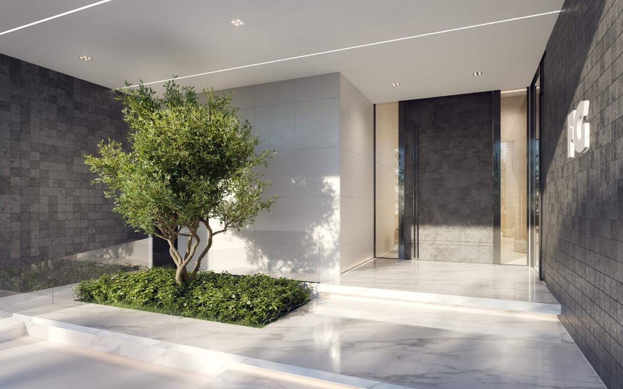 Apartamento à venda no Centro: Entrada do Iconic Tower, com jardim e árvore no acesso (imagem ilustrativa)