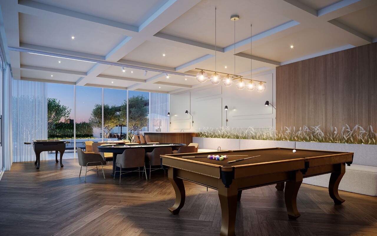 Apartamento à venda no Centro: Sala de jogos com mesa de sinuca e mesas de carteado (imagem ilustrativa)