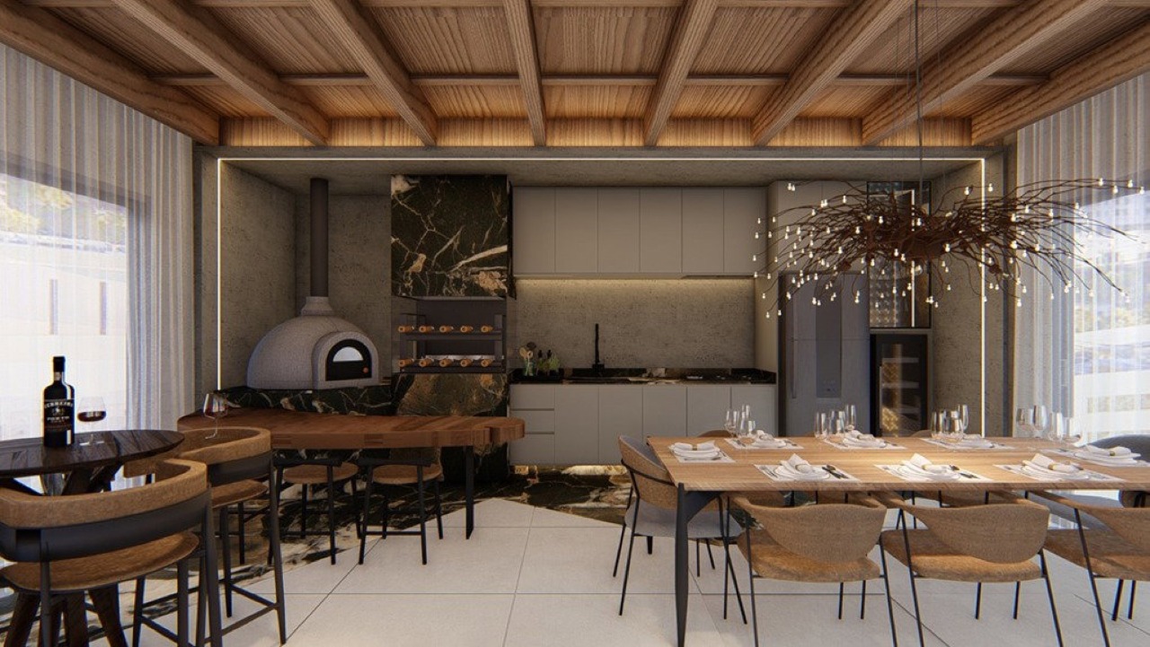 Apartamento à venda no Centro: Espaço gourmet com forno de pizza e mesa comunitária (imagem ilustrativa)