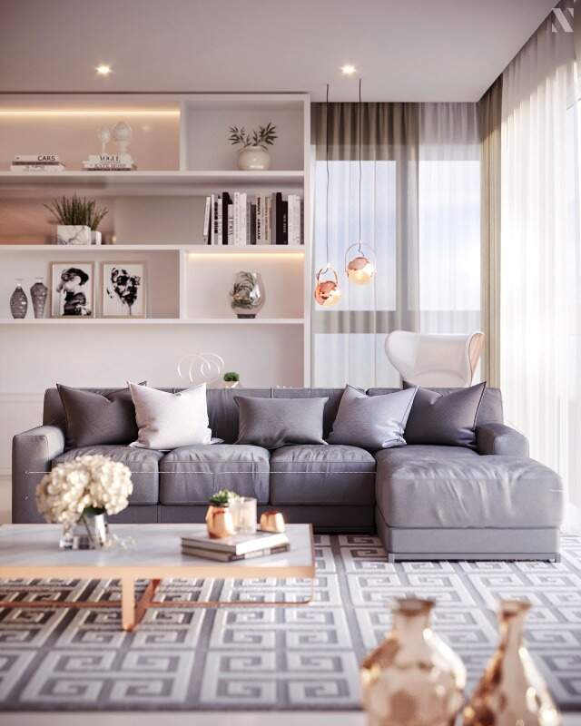 Apartamento à venda no Centro: Living com estante iluminada e sofá em L no apartamento decorado (imagem ilustrativa)