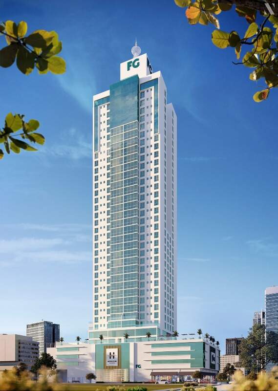 Apartamento à venda no Centro: Torre do Horizon Residence de dia, com o logo da FG no topo (imagem ilustrativa)