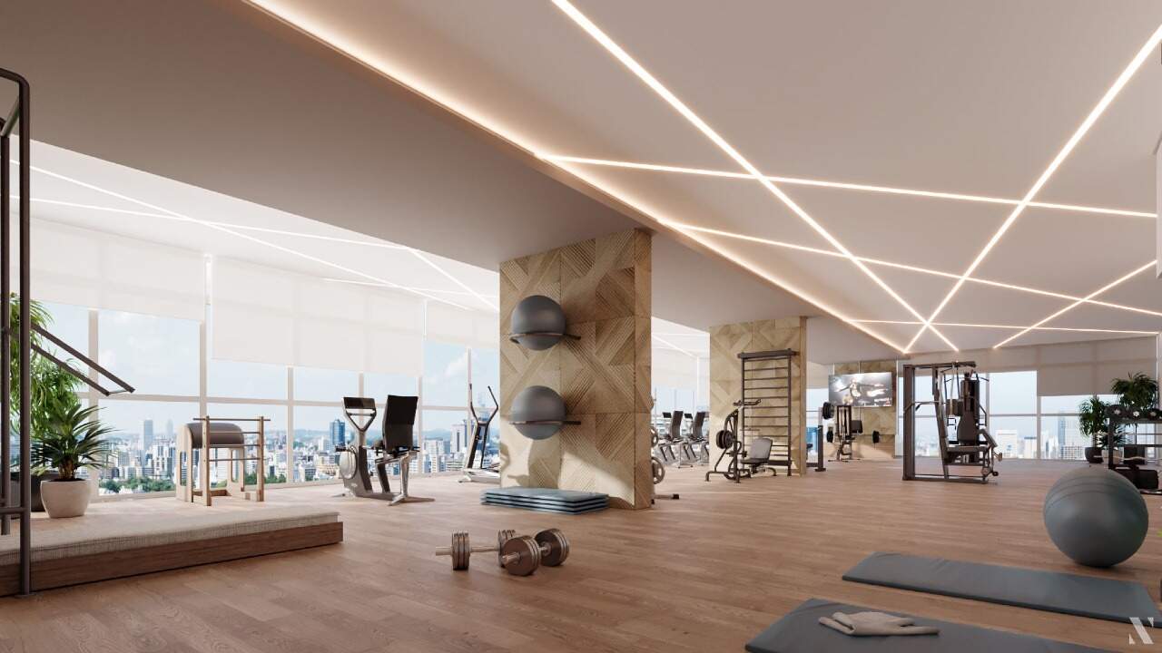 Apartamento à venda no Centro: Academia com aparelhos e vista para a cidade (imagem ilustrativa)
