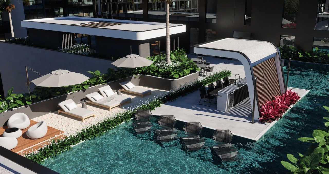 Apartamento à venda no Pioneiros: Piscina com espreguiçadeiras e bar molhado no lazer do prédio (imagem ilustrativa)