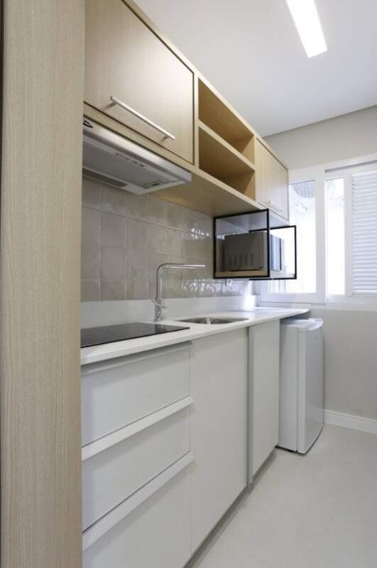 Apartamento à venda no Centro: Cozinha compacta do studio com cooktop e pia