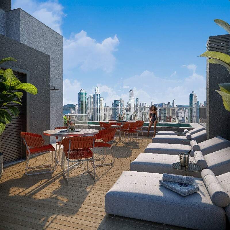 Apartamento à venda no Centro: Deck do rooftop com espreguiçadeiras (imagem ilustrativa)