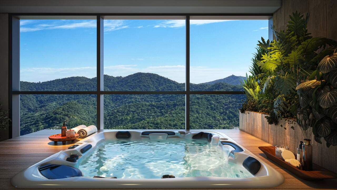 Apartamento diferenciado à venda no Pioneiros: Hidromassagem do spa com vista para os morros (imagem ilustrativa)