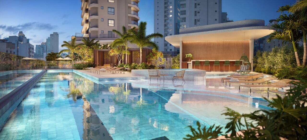Apartamento diferenciado à venda no Centro: Piscina adulto e pool bar ao entardecer (imagem ilustrativa)